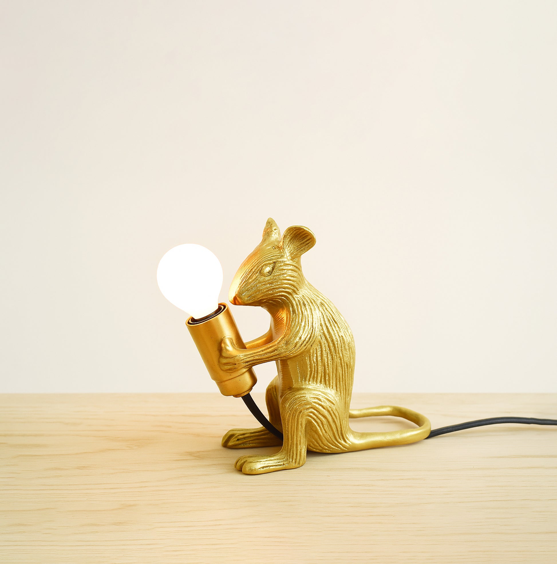Brighten Up with a Stunning Golden Mouse Lamp Golden