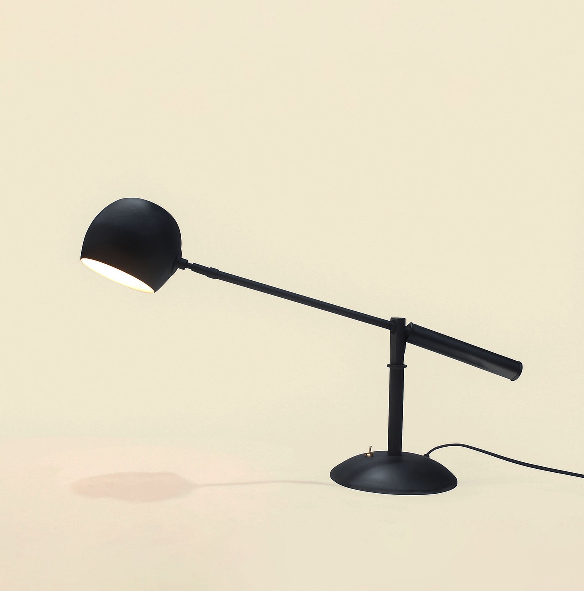 The Art of Lighting: Discover the See-Saw Table Lamp matte black