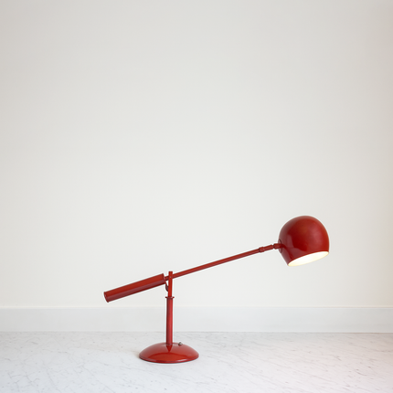 The Art of Lighting: Discover the See-Saw Table Lamp red