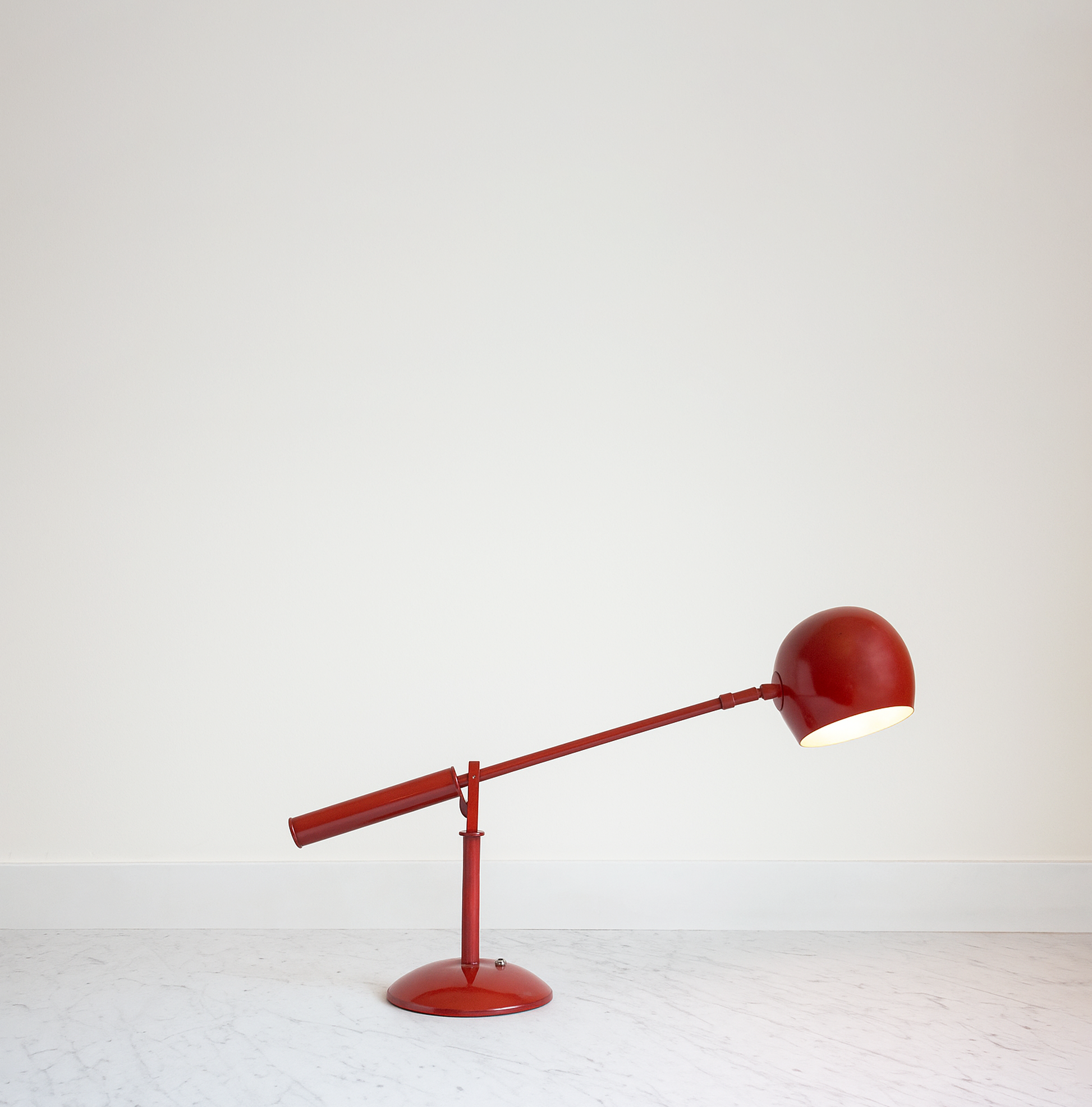 The Art of Lighting: Discover the See-Saw Table Lamp red
