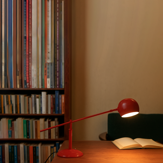 The Art of Lighting: Discover the See-Saw Table Lamp red