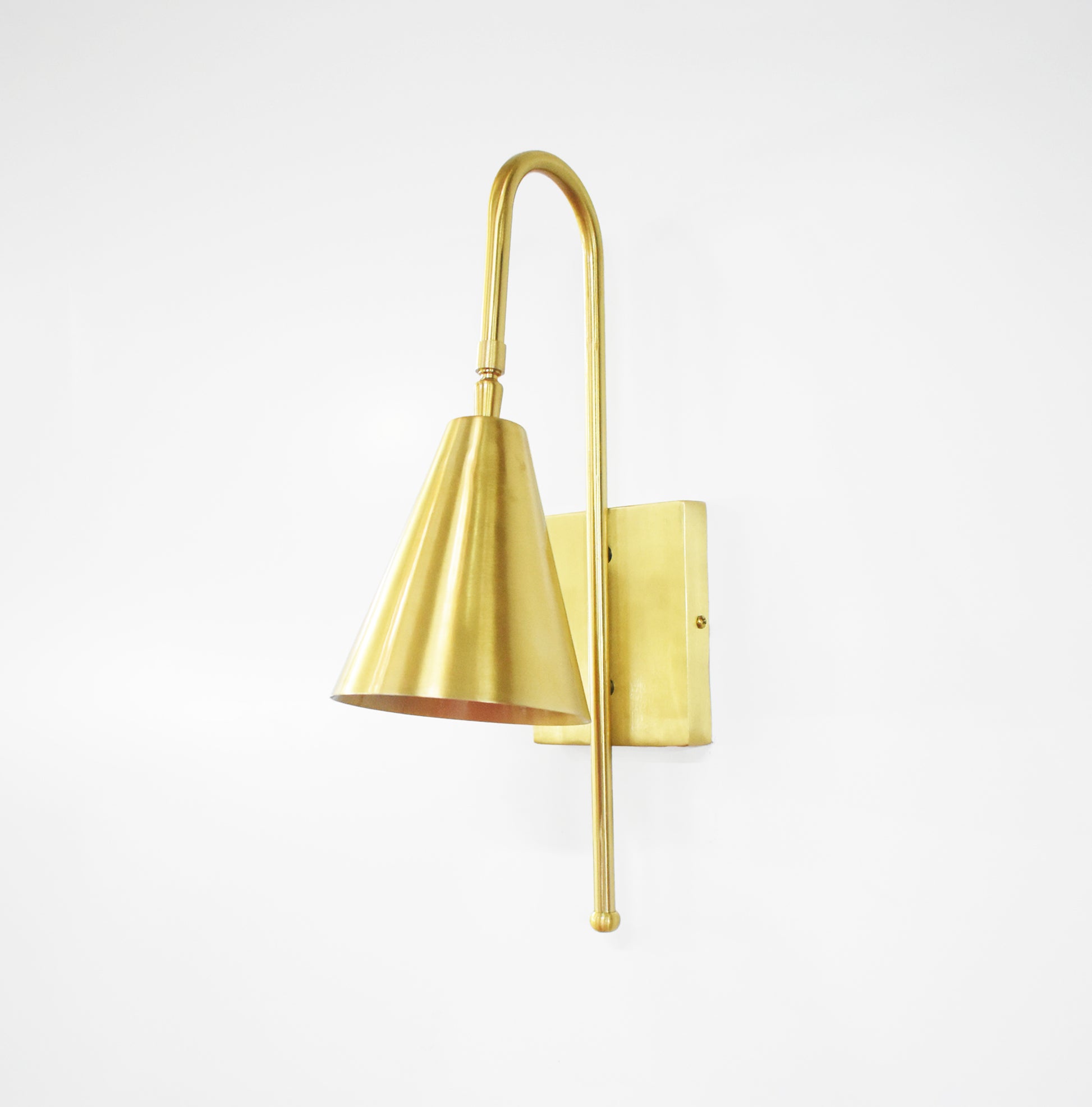 Illuminate Your Space with Golden Wall Sconces