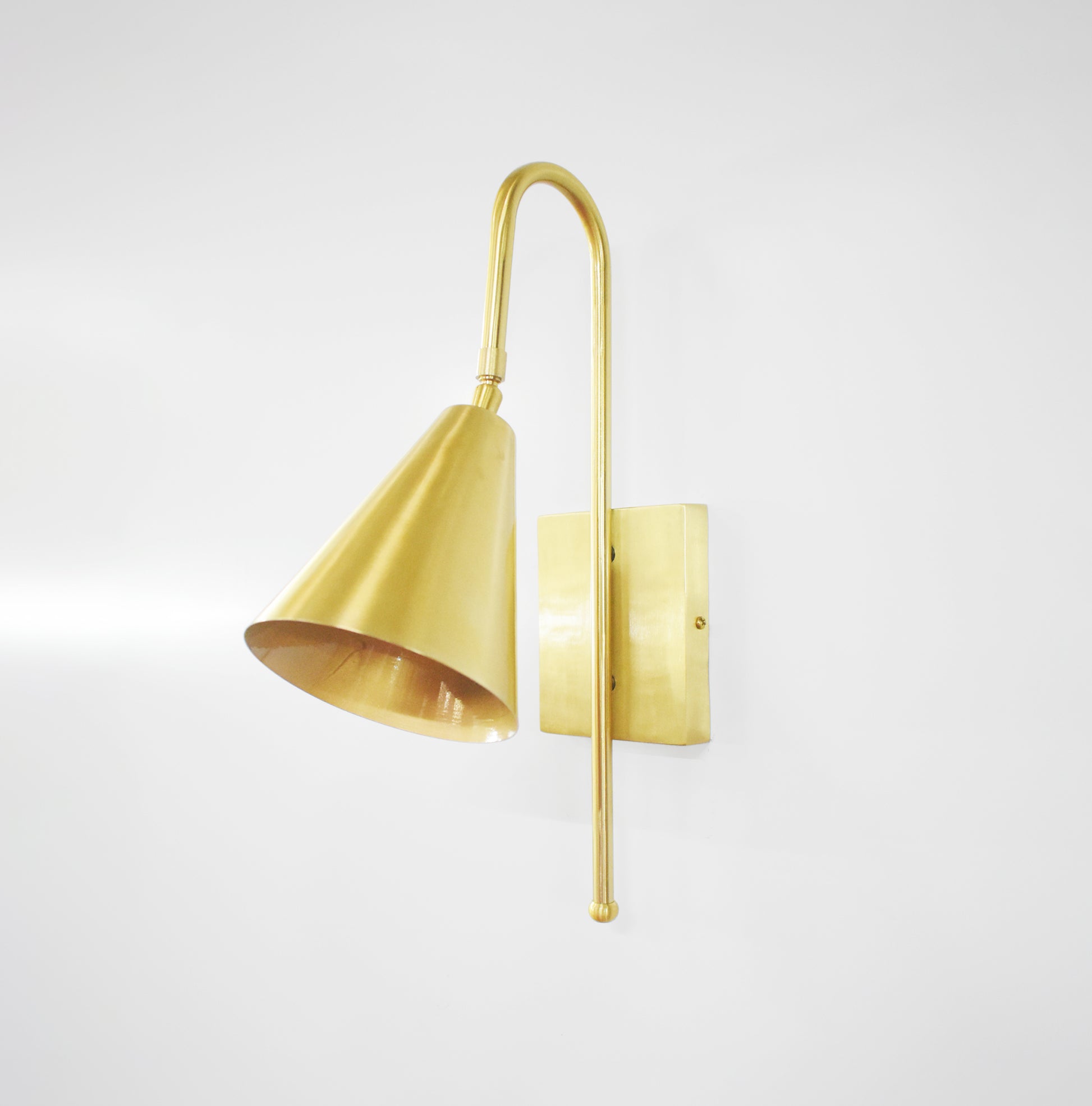 Illuminate Your Space with Golden Wall Sconces