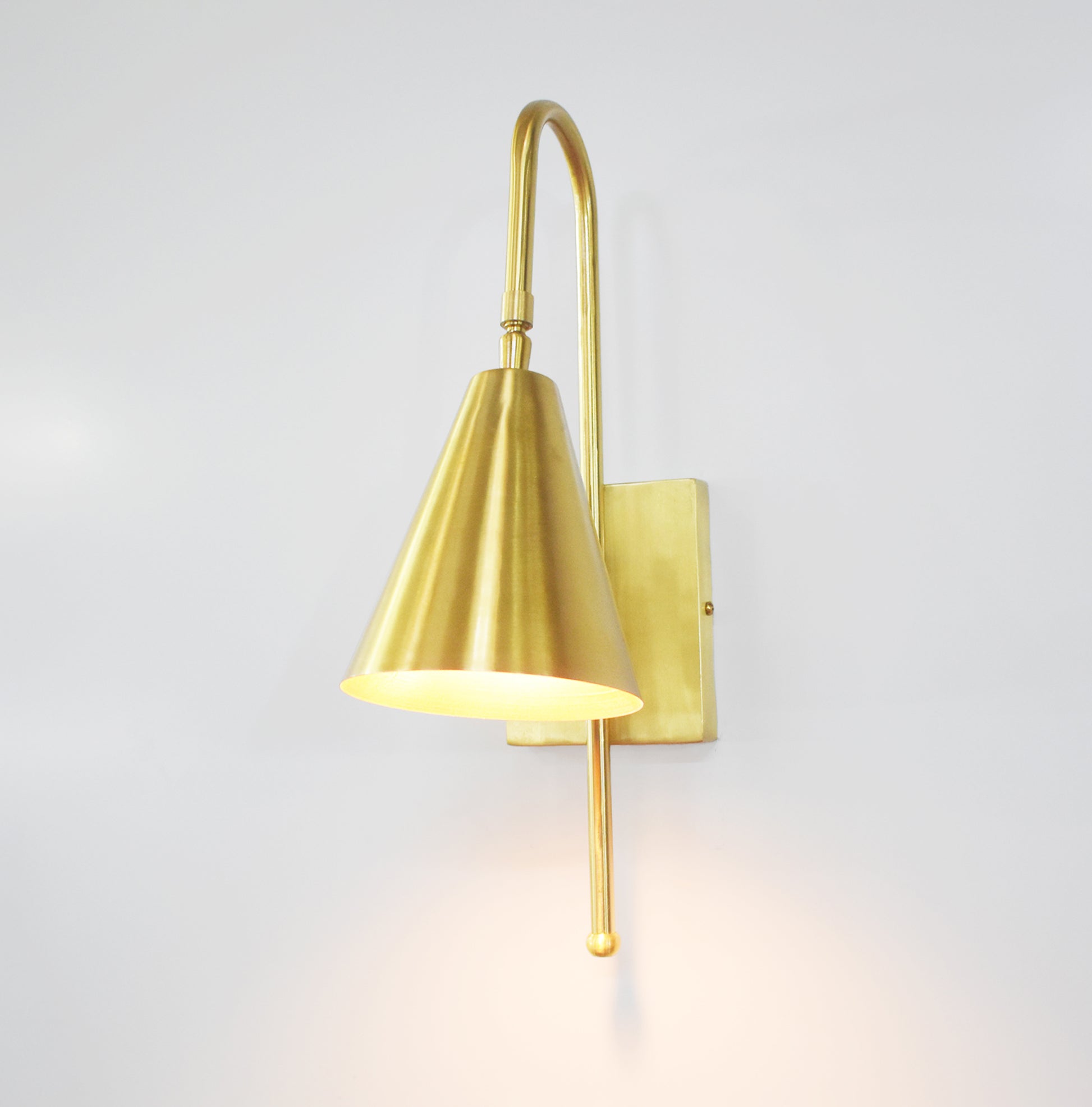 Illuminate Your Space with Golden Wall Sconces