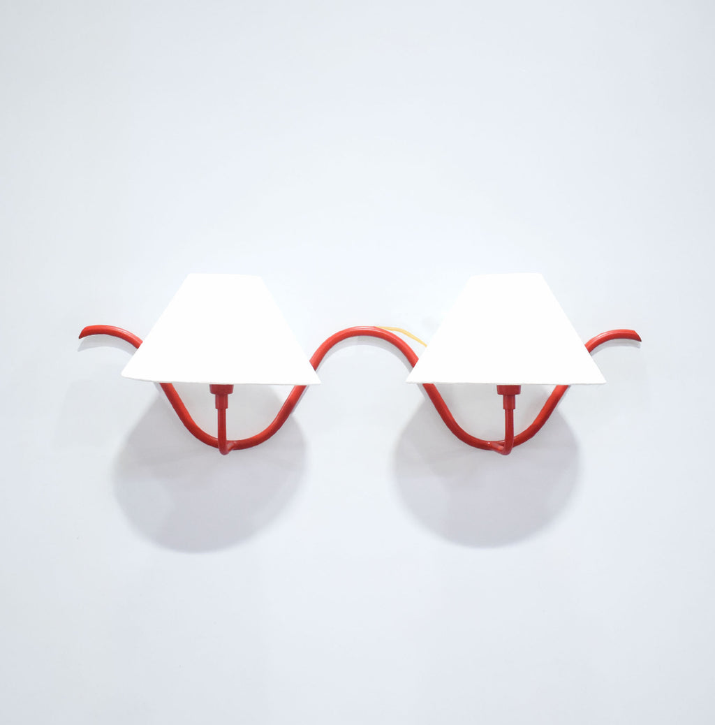Red Wall Lamps Featuring Dual Bulbs