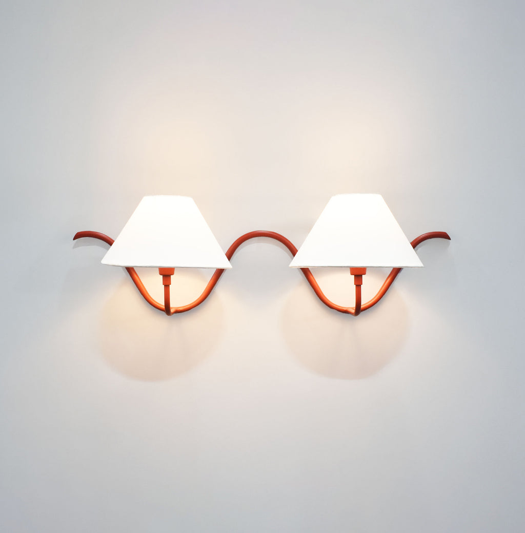 Red Wall Lamps Featuring Dual Bulbs